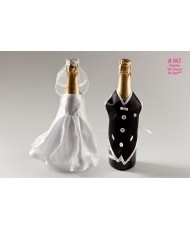 B 062 Костюмчики на шампанское жених и невеста комплект